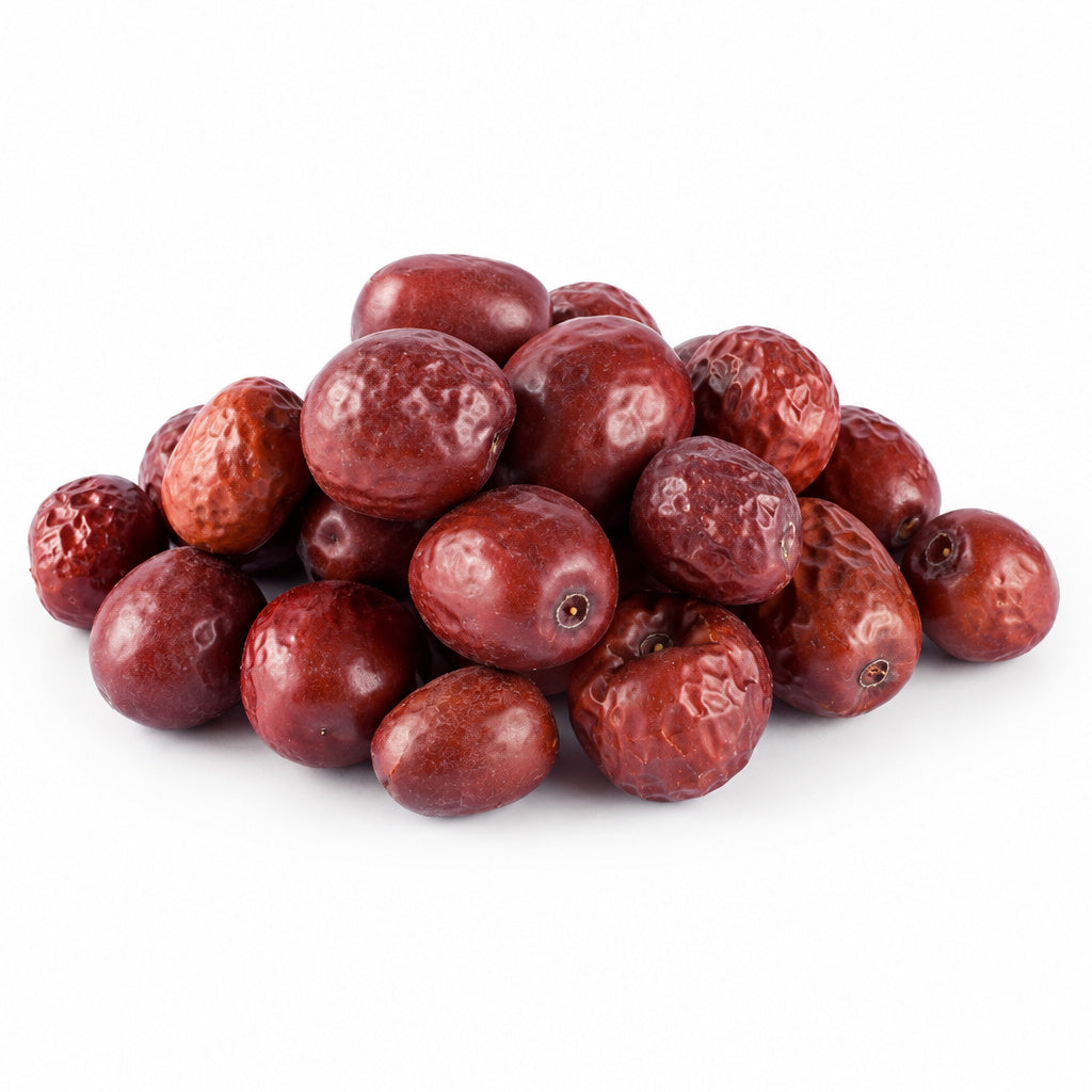 Create a photorealistic, high-end commercial product photograph of the uploaded Tavazo Jujube, rendered from a visibly d