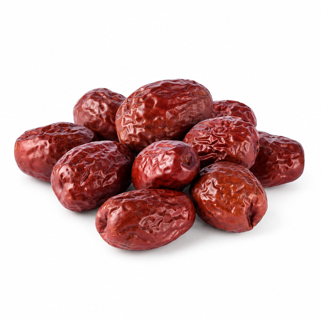 Create a photorealistic, high-end commercial product photograph of the uploaded Jujube (Jumbo), rendered from a visibly