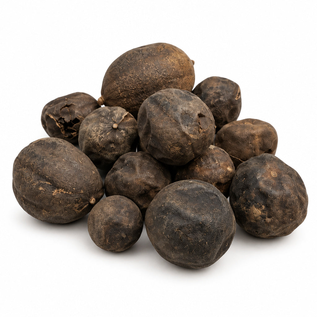 Create a photorealistic, high-end commercial product photograph of the uploaded Dried Black Lemons - Limo Amani, rendere