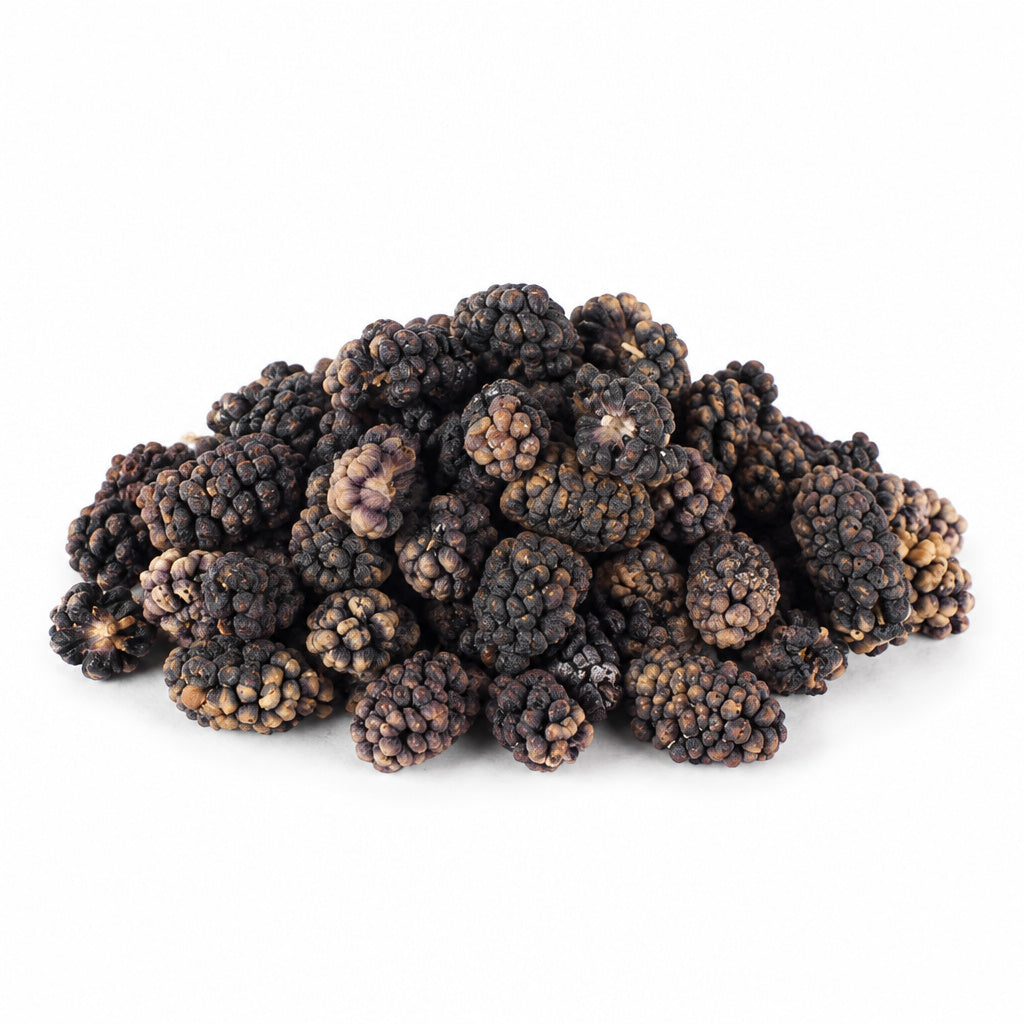 Create a photorealistic, high-end commercial product photograph of the uploaded Dried Mulberries - Black, rendered from